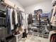 Walk-in closet with custom shelving for optimal clothing and accessory storage at 3791 Harveys Path, Greenwood, IN 46143