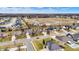 An aerial view of a well-planned neighborhood with a mix of single-Gathering homes and green spaces at 3801 S Cedar Creek Ln, New Palestine, IN 46163