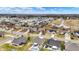 An aerial view of a beautiful residential neighborhood with well-maintained lawns and attractive single-Gathering homes at 3801 S Cedar Creek Ln, New Palestine, IN 46163