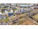 Neighborhood aerial view with lush backyards and a serene pond adding to the community's appeal at 3801 S Cedar Creek Ln, New Palestine, IN 46163