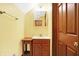 Small upstairs bathroom with yellow walls and vanity at 3801 S Cedar Creek Ln, New Palestine, IN 46163