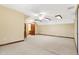Bright bedroom features a ceiling fan, neutral colored walls, and carpet flooring at 3801 S Cedar Creek Ln, New Palestine, IN 46163