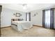 Neutral bedroom with comfortable carpet and decorative lamps at 3801 S Cedar Creek Ln, New Palestine, IN 46163