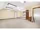 Unfurnished bedroom featuring a ceiling fan, neutral colored walls, and carpet flooring at 3801 S Cedar Creek Ln, New Palestine, IN 46163