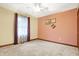 Cozy bedroom features neutral carpet, natural light and wall decor at 3801 S Cedar Creek Ln, New Palestine, IN 46163