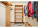 Walk-in closet with multiple shelves and hanging rods at 3801 S Cedar Creek Ln, New Palestine, IN 46163