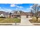 Beautiful brick home with a well-maintained lawn and a large driveway at 3801 S Cedar Creek Ln, New Palestine, IN 46163