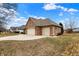 Brick home with a three-car garage and a well-kept lawn at 3801 S Cedar Creek Ln, New Palestine, IN 46163