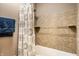 This bathroom has a shower with tiled walls and a shower curtain at 3840 Knollton Rd # A, Indianapolis, IN 46228