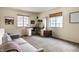 This bedroom features a built-in desk and a cozy couch at 3840 Knollton Rd # A, Indianapolis, IN 46228