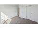 Bedroom featuring carpet and closet with sliding doors at 4825 Topaz Pointe Blvd, Lawrence, IN 46235
