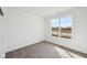 Bright bedroom with natural light and plush carpet at 4825 Topaz Pointe Blvd, Lawrence, IN 46235