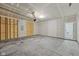 Unfinished garage with concrete floor and door leading to the interior at 4825 Topaz Pointe Blvd, Lawrence, IN 46235