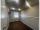 Empty bedroom with neutral walls, carpet, and window offering natural light, creating a blank canvas for personalization at 504 Iroquois Dr, Anderson, IN 46012