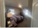 Bedroom with dark brown wooden accents and plentiful sunlight at 504 Iroquois Dr, Anderson, IN 46012