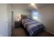Bedroom with a bed and neutral decor at 504 Iroquois Dr, Anderson, IN 46012