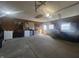 Functional garage features laundry machines, storage, and a window for natural light, providing a versatile space at 504 Iroquois Dr, Anderson, IN 46012