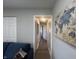 Hallway decorated with a world map painting at 504 Iroquois Dr, Anderson, IN 46012