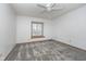 Bedroom featuring neutral carpet, ceiling fan, natural light and neutral walls at 5214 Woodfield Dr, Carmel, IN 46033