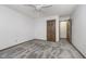 Bedroom with neutral carpet, ceiling fan, and closet space at 5214 Woodfield Dr, Carmel, IN 46033