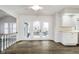Light-filled dining room with hardwood floors and access to a deck, perfect for entertaining at 5214 Woodfield Dr, Carmel, IN 46033