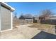 Fenced backyard featuring a concrete patio and a small patch of grass at 569 N Tacoma Ave, Indianapolis, IN 46201