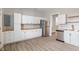 Modern kitchen with white cabinets, stainless steel appliances, and stylish butcher block countertops at 569 N Tacoma Ave, Indianapolis, IN 46201