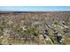 An aerial view showing a mature residential area with tree-lined streets and varied architectural home styles at 5935 Compton St, Indianapolis, IN 46220