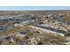 An aerial view showcasing a bustling neighborhood with many shops, restaurants, and community activities at 5935 Compton St, Indianapolis, IN 46220