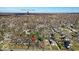 An aerial view showing a mature residential area with tree-lined streets and varied architectural home styles at 5935 Compton St, Indianapolis, IN 46220
