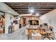 Unfinished basement offers storage and workshop space with exposed ductwork and concrete flooring at 5935 Compton St, Indianapolis, IN 46220