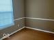 Comfortable Living Room features vinyl floors at 6030 Tybalt Cir, Indianapolis, IN 46254