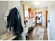 Inviting mudroom includes storage, coat hooks, and convenient pet feeding station at 6416 E Urmeyville Rd, Franklin, IN 46131