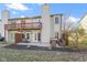 Back of the property with deck, patio space, and small lawn area at 6454 Bay Harbor Ln, Indianapolis, IN 46254