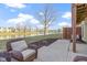 Inviting backyard views of the pond with seating and landscaping at 6454 Bay Harbor Ln, Indianapolis, IN 46254