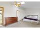Main bedroom featuring a skylight, ceiling fan, carpet, and a dresser at 6454 Bay Harbor Ln, Indianapolis, IN 46254