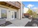 Back patio with exterior access features space for outdoor seating at 6454 Bay Harbor Ln, Indianapolis, IN 46254