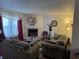 Inviting living room with plush sofas, a fireplace, and decor that adds a cozy, personal touch at , Indianapolis, IN 46217