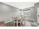 Bright dining room featuring hardwood floors, and a large window at 6713 Cardiff Dr, McCordsville, IN 46055