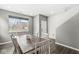 Bright dining room featuring hardwood floors, and a staircase at 6713 Cardiff Dr, McCordsville, IN 46055