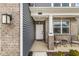 Inviting entryway with covered front porch at 6713 Cardiff Dr, McCordsville, IN 46055
