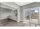 Bright sunroom with backyard access and view into living room at 6713 Cardiff Dr, McCordsville, IN 46055