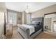 Bedroom with large bed, carpet floors, and chandelier at 681 Greenford N Trl, Carmel, IN 46032