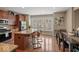 Eat-in kitchen with stainless steel appliances, granite countertops, a center island, and plenty of storage at 681 Greenford N Trl, Carmel, IN 46032