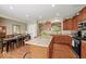 Spacious kitchen with a large island, stainless steel appliances, granite countertops, and wood cabinetry at 681 Greenford N Trl, Carmel, IN 46032
