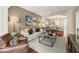 Open living room with a seamless layout flowing into the dining area, perfect for modern living and entertaining at 681 Greenford N Trl, Carmel, IN 46032