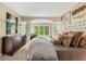Serene main bedroom suite offering comfort and style, with a view of the outdoors creating a peaceful environment at 681 Greenford N Trl, Carmel, IN 46032