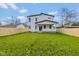 Large backyard with a full fence, providing privacy and a safe area for outdoor activities and entertainment at 711 N Fenton Ave, Indianapolis, IN 46219