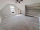 Bedroom featuring neutral carpet, a ceiling fan, closet and natural light at 726 E Mccarty St, Indianapolis, IN 46203