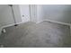 Neutral bedroom with carpet, a ceiling fan, natural light, and white trim at 726 E Mccarty St, Indianapolis, IN 46203